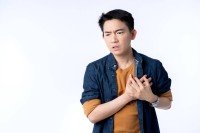 close-up-young-asian-male-businessman-casual-costume-hand-touch-heart-with-stroke-heart-attack-with-gesture-action-express-ill-sickness-bad-health-ideas-concept-white-background